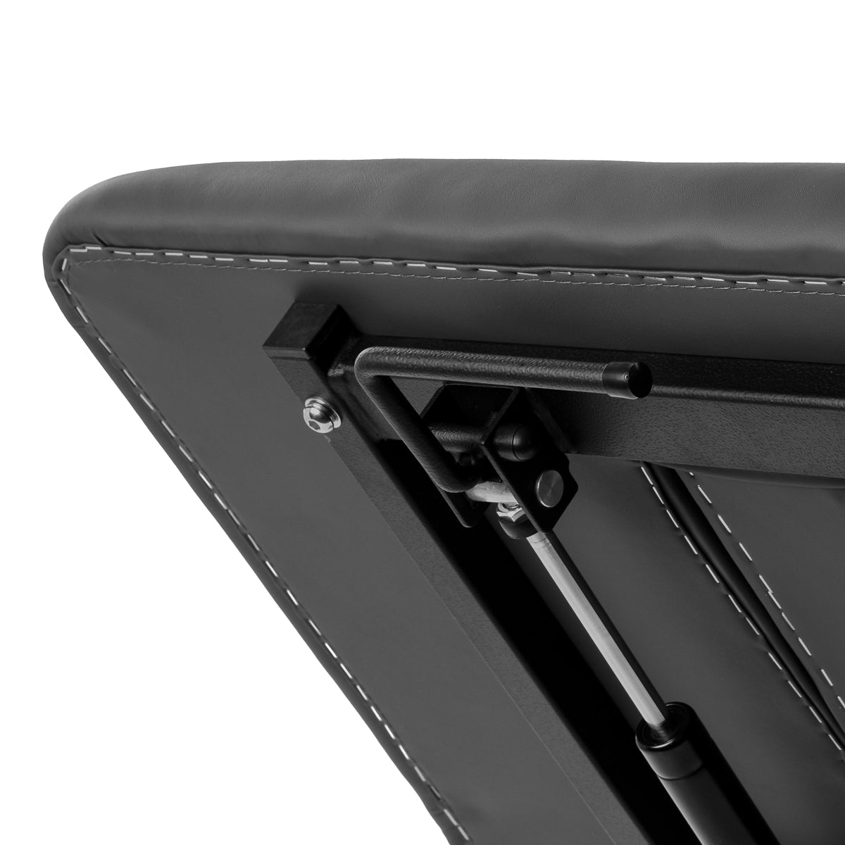 Hand control storage holder beneath BALANCE Novus 2 tabletop