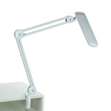 Sonobella Moon LED BSL-12 workshop lamp by Beauty System, showing the sleek black portable LED light with adjustable brightness controls.