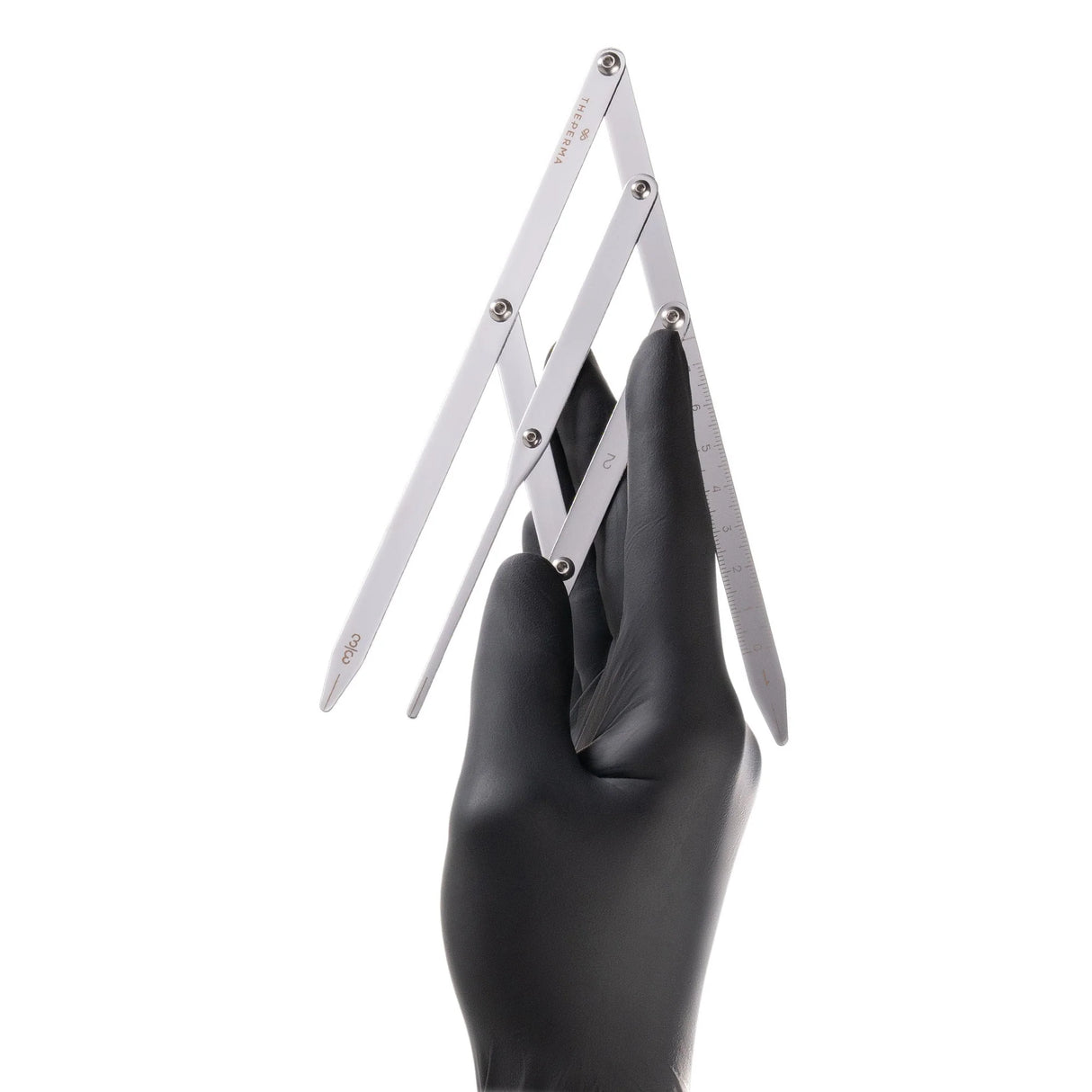 The Perma Golden Ratio Divider Brow Compass used for precise eyebrow shaping and measurement with branded design.