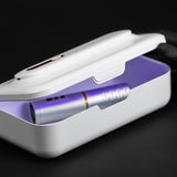 UV sterilizer for tattoo machines from BVShop, showing the compact sterilization device with clear lid and control panel.